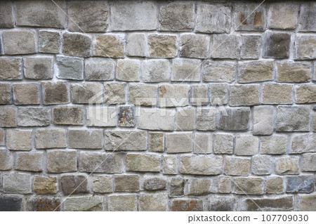 Texture of old grey stone wall with various stones Texture of old grey stone wall with various stones 107709030