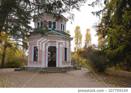 Scenic view of Pink Pavilion on Island of Anti-Circe in Sofiyivka park, Uman Scenic view of Pink Pavilion on Island of Anti-Circe in Sofiyivka park, Uman 107709104