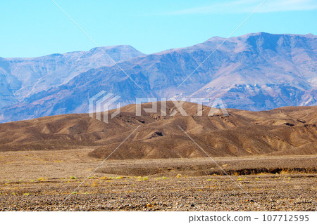 A view of mountains in a haze in a US national park. A view of mountains in a haze in a US national park. 107712595