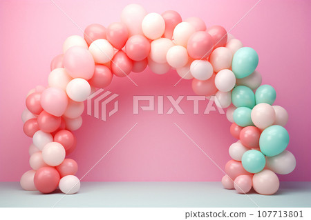 Helium balloons arch on pastel background. Wall decorated with colorful balloons for birthday party, baby shower, wedding. Mockup, template for greeting card. Composition with balloons, space for text 107713801