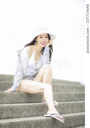 Beautiful Mrs. in a white bikini 107714848