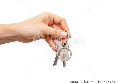 Woman holding keys with house shaped keychain 107716575
