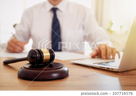 Lawyer or attorney working in the office 107716576
