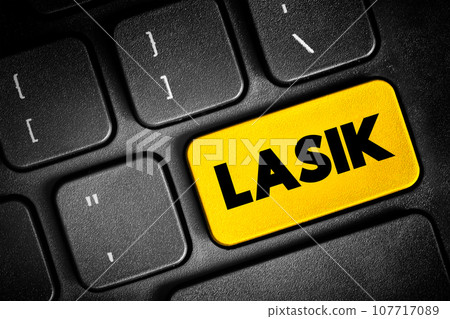 LASIK commonly referred to as laser eye surgery or laser vision correction, text button on keyboard, concept background 107717089