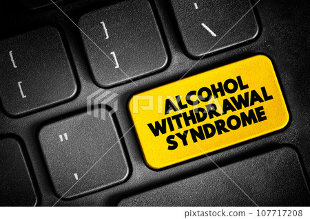 Alcohol Withdrawal Syndrome is a set of symptoms that can occur following a reduction in alcohol use after a period of excessive use, text button on keyboard, concept background Alcohol Withdrawal Syndrome is a set of symptoms that can occur following a reduction in alcohol use after a period of excessive use, text button on keyboard, concept background 107717208