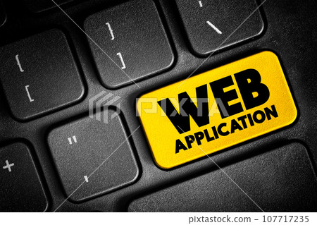 Web Application - program that is stored on a remote server and delivered over the Internet through a browser interface, text concept button on keyboard 107717235