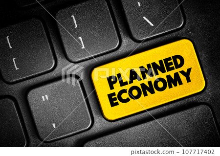 Planned Economy is a type of economic system, text button on keyboard, concept background 107717402