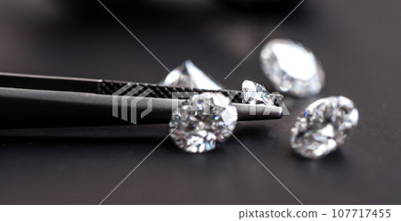 Diamonds on black background Diamonds on black background 107717455