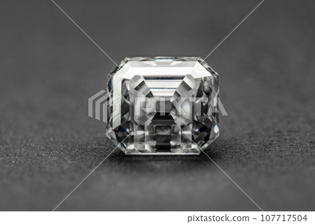 Fancy diamond on black background 107717504