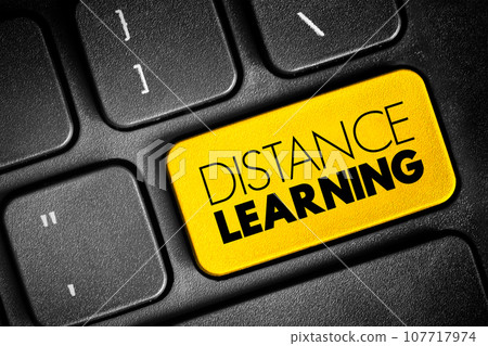 Distance learning - education of students who may not always be physically present at a school, text button on keyboard 107717974