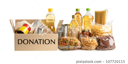 Foodstuff for donation, storage and delivery. Various food, pasta, cooking oil and canned food in cardboard box. 107720115