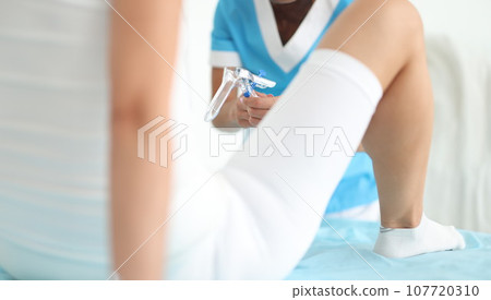 Woman is being examined by a gynecologist closeup Woman is being examined by a gynecologist closeup 107720310