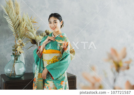 Woman in long-sleeved kimono Woman in long-sleeved kimono 107721587