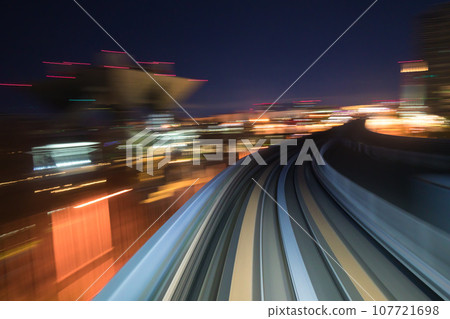Motion blurred of train moving inside tunnel with 107721698