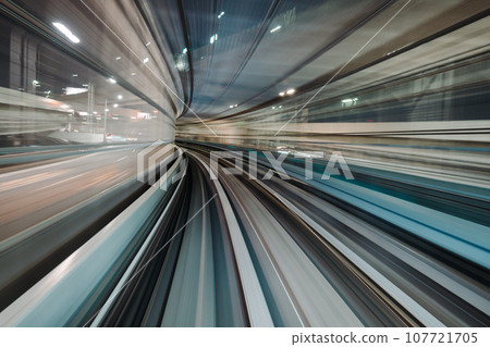 Motion blurred of train moving inside tunnel with 107721705