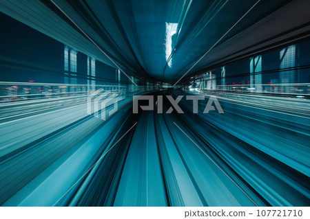 Motion blurred of train moving inside tunnel with 107721710