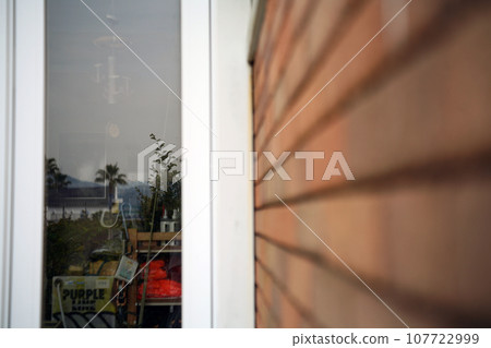 Seaside shop window glass 107722999