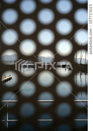 Marina through the fence 107723023