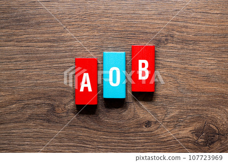 AOB - Assignment of benefits or Any other business, word concept on building blocks, text 107723969