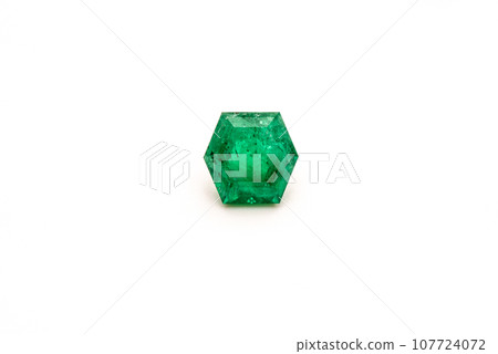 Natural emeralds on white background Natural emeralds on white background 107724072