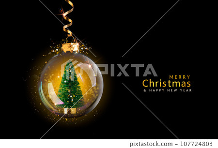 Transparent golden ball with Christmas tree inside on black noble background. Premium New Year background with Christmas golden decoration Transparent golden ball with Christmas tree inside on black noble background. Premium New Year background with Christmas golden decoration 107724803