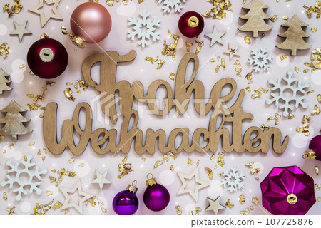German Text Frohe Weihnachten, Means Merry Christmas In English, Flatlay German Text Frohe Weihnachten, Means Merry Christmas In English, Flatlay 107725876