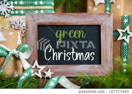 Text Green Christmas, With Green Sustainable Winter Decor 107725943