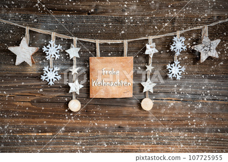 Wooden Decorated Christmas Label With Text Frohe Weihnachten, Snowy Wooden Decorated Christmas Label With Text Frohe Weihnachten, Snowy 107725955
