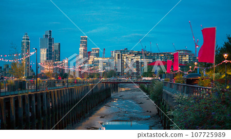 Square near the Thames river in London at evening, United Kingdom 107725989