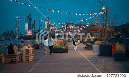 Square near the Thames river in London at evening, United Kingdom 107725990