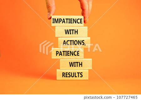 Action and result symbol. Concept words Impatience with actions patience with results on wooden block. Beautiful orange table orange background. Businessman hand. Business action result concept. 107727465