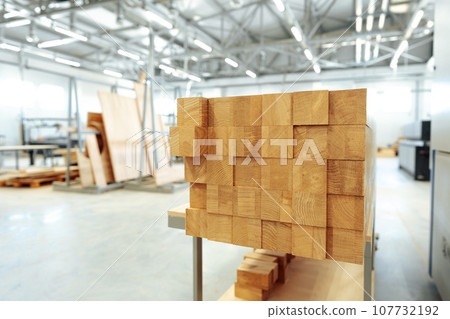 Stacked wooden bars in workshop of furniture manufacture 107732192