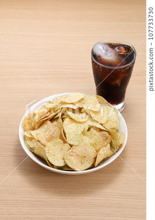 Potato chips and cola Potato chips and cola 107733730