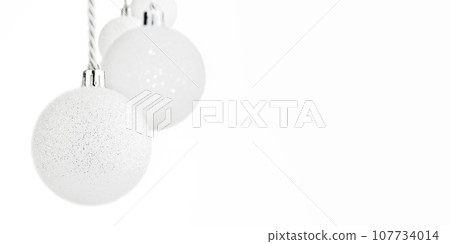 Fine Christmas ornaments, snowflakes and baubles. Christmas balls background. Fine Christmas ornaments, snowflakes and baubles. Christmas balls background. 107734014