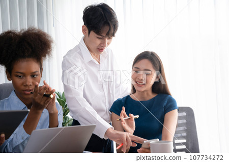 Modern multicultural office worker in corporate workplace. Concord Modern multicultural office worker in corporate workplace. Concord 107734272