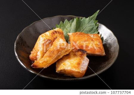 Grilled silver salmon belly 107737704