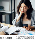 A woman who is busy organizing bills. A housewife who is busy calculating receipts and is struggling with her household finances. 107738055