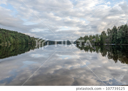 Lake Ragnerudssjoen mirror in Dalsland Sweden beautiful nature forest pinetree swedish Lake Ragnerudssjoen mirror in Dalsland Sweden beautiful nature forest pinetree swedish 107739125