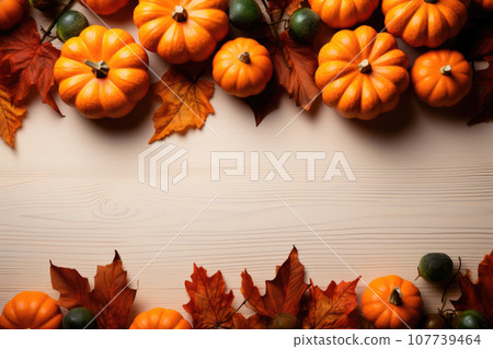 Flat lay Thanksgiving and Autumn decoration concept made from autumn leaves and pumpkin on white background 107739464
