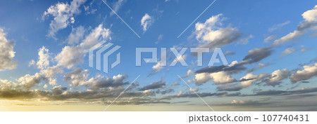 Bright spring sky with white cloud, horison skyline background Bright spring sky with white cloud, horison skyline background 107740431