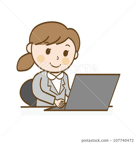 A female office worker in a suit working on a computer A female office worker in a suit working on a computer 107740472