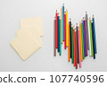 Clean sheets for notes and color pencils on white background top view  107740596