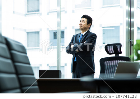 Managers thinking in the office Managers thinking in the office 107741128