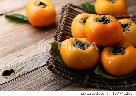 Very sweet autumn taste Persimmon fruit (Old board back) Persimmon fruit 107741295