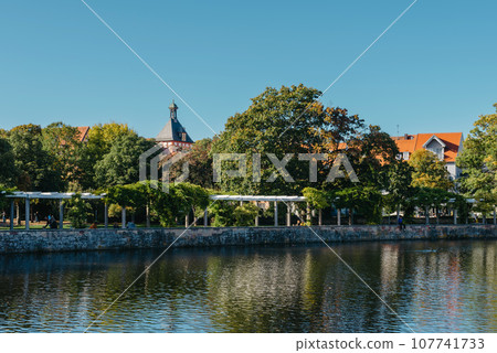 City Pond in Old European City Bietigheim-Bissingen In Germany. the City Park of Bietigheim-Bissingen, Baden-Wuerttemberg, Germany, Europe. Autumn Park and nature City Pond in Old European City Bietigheim-Bissingen In Germany. the City Park of Bietigheim-Bissingen, Baden-Wuerttemberg, Germany, Europe. Autumn Park and nature 107741733