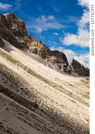 Rugged mountain landscape with rocky pinnacles of Paternkofel in Dolomites Rugged mountain landscape with rocky pinnacles of Paternkofel in Dolomites 107741955