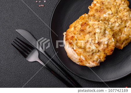 Delicious meat fried with Dijon mustard with salt, spices and herbs 107742189