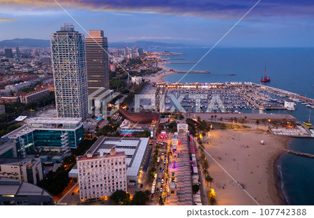 Aerial view of seaside area of Barcelona in summer dusk, Spain 107742388