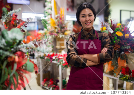 Portrait of asian woman, flower shop owner Portrait of asian woman, flower shop owner 107743394