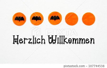 Halloween Background With Bats And Text Herzlich Willkommen Halloween Background With Bats And Text Herzlich Willkommen 107744538